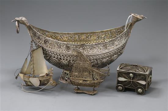 An Indian? white metal oval bowl with ring handles and three other items including two filligree items.
